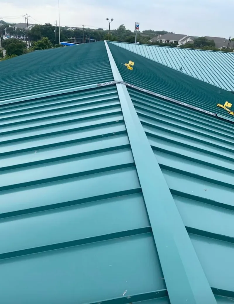 Green commercial metal roof ridge and valley for Metal Roof Repair in Fishers