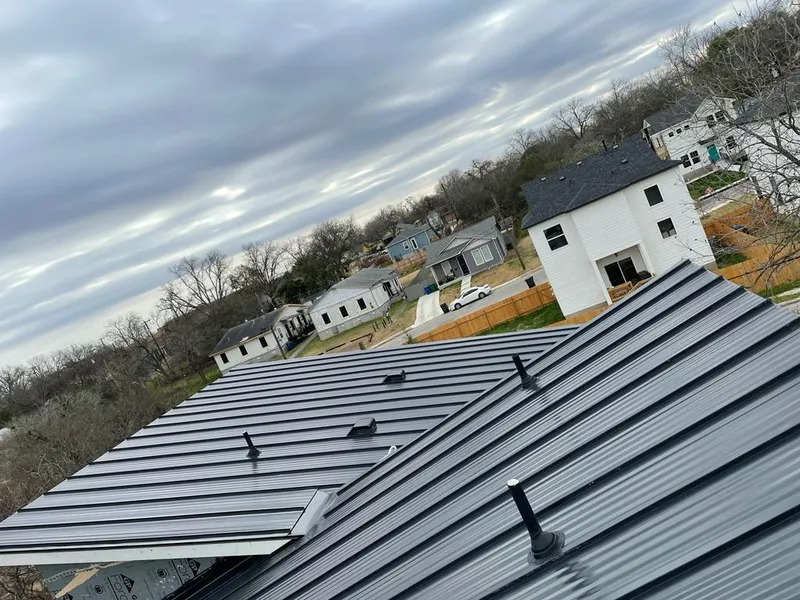 Standing seam metal roof panels with vents for Skylight Repair in Fishers